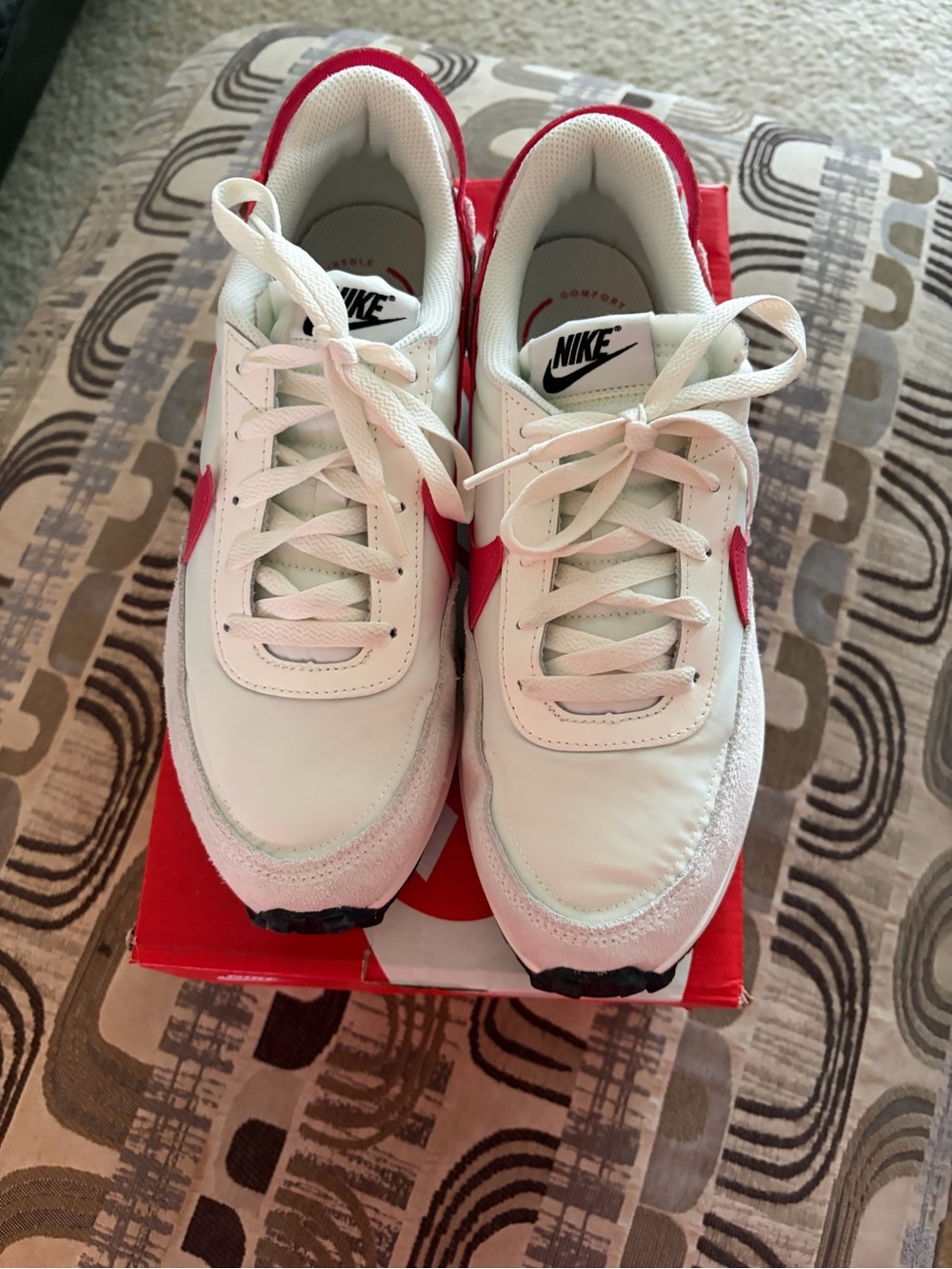 Nike White Sneakers with Red Swoosh Accents